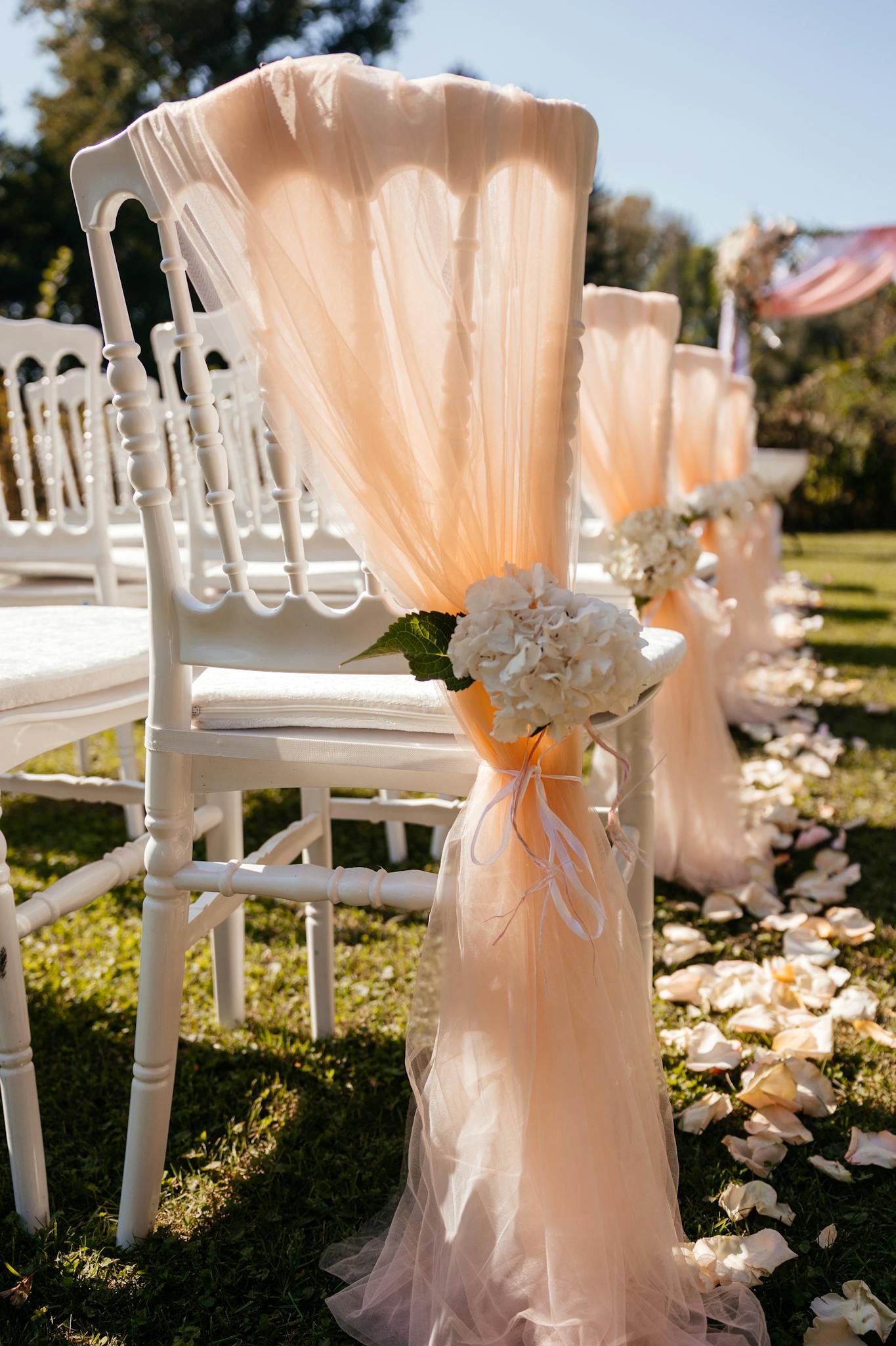 About Chic Outdoor Wedding Setup With White Chairs